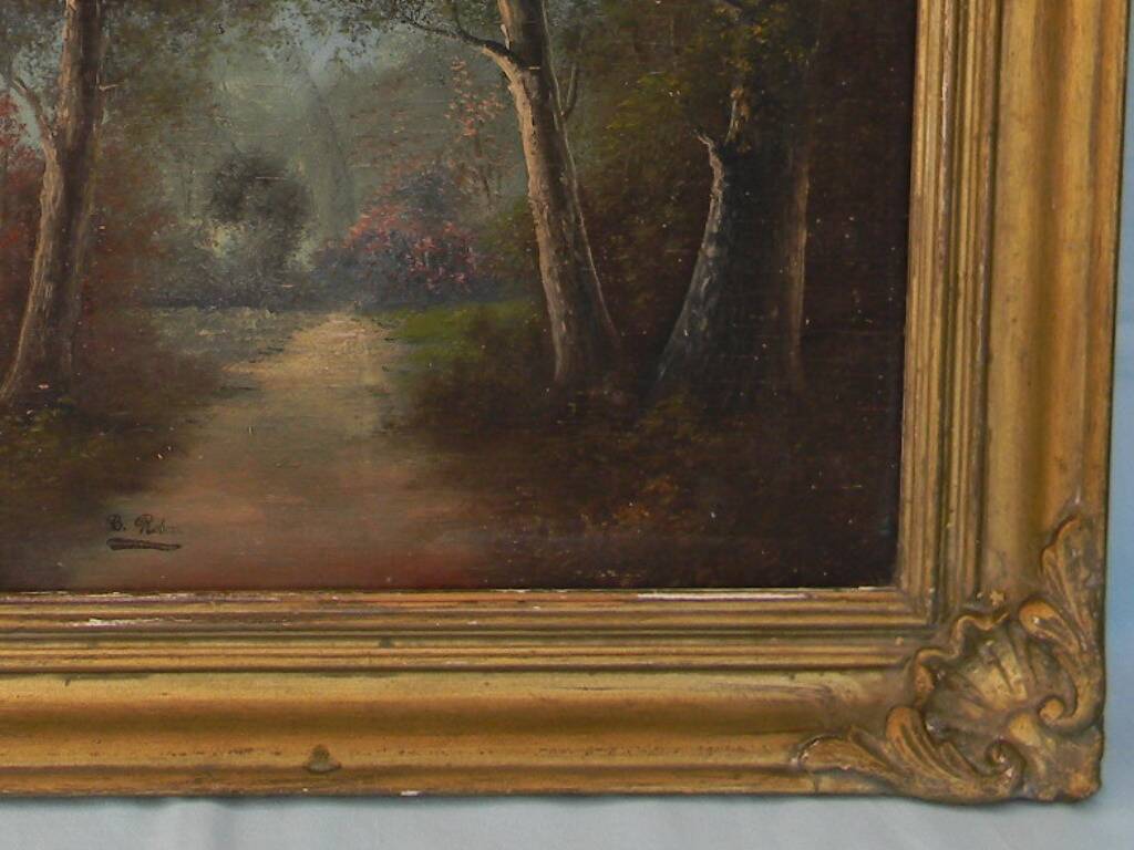 Old signed landscape painting under wood.