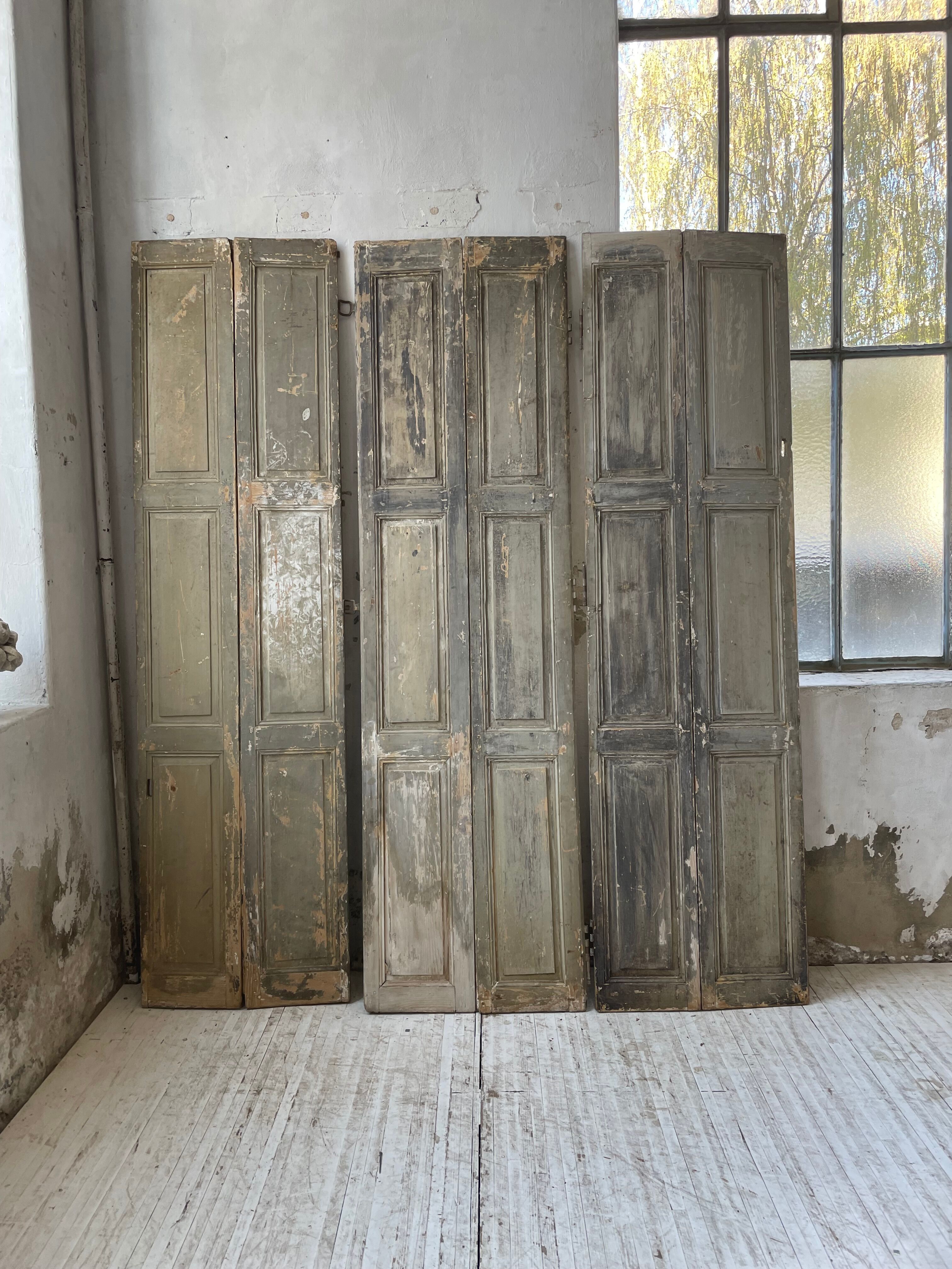 Trio of shutters louvers patina blue gray