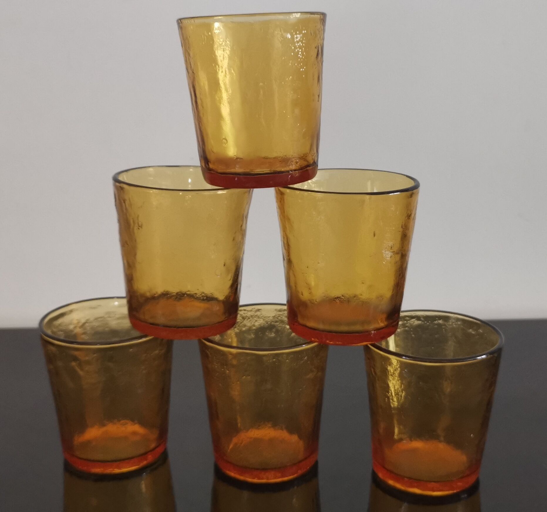 6 old amber colored glasses "lever" year 1970