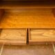 Secretary with drop-leaf in Louis XVI style, made of solid wood and brass, desk/commode.