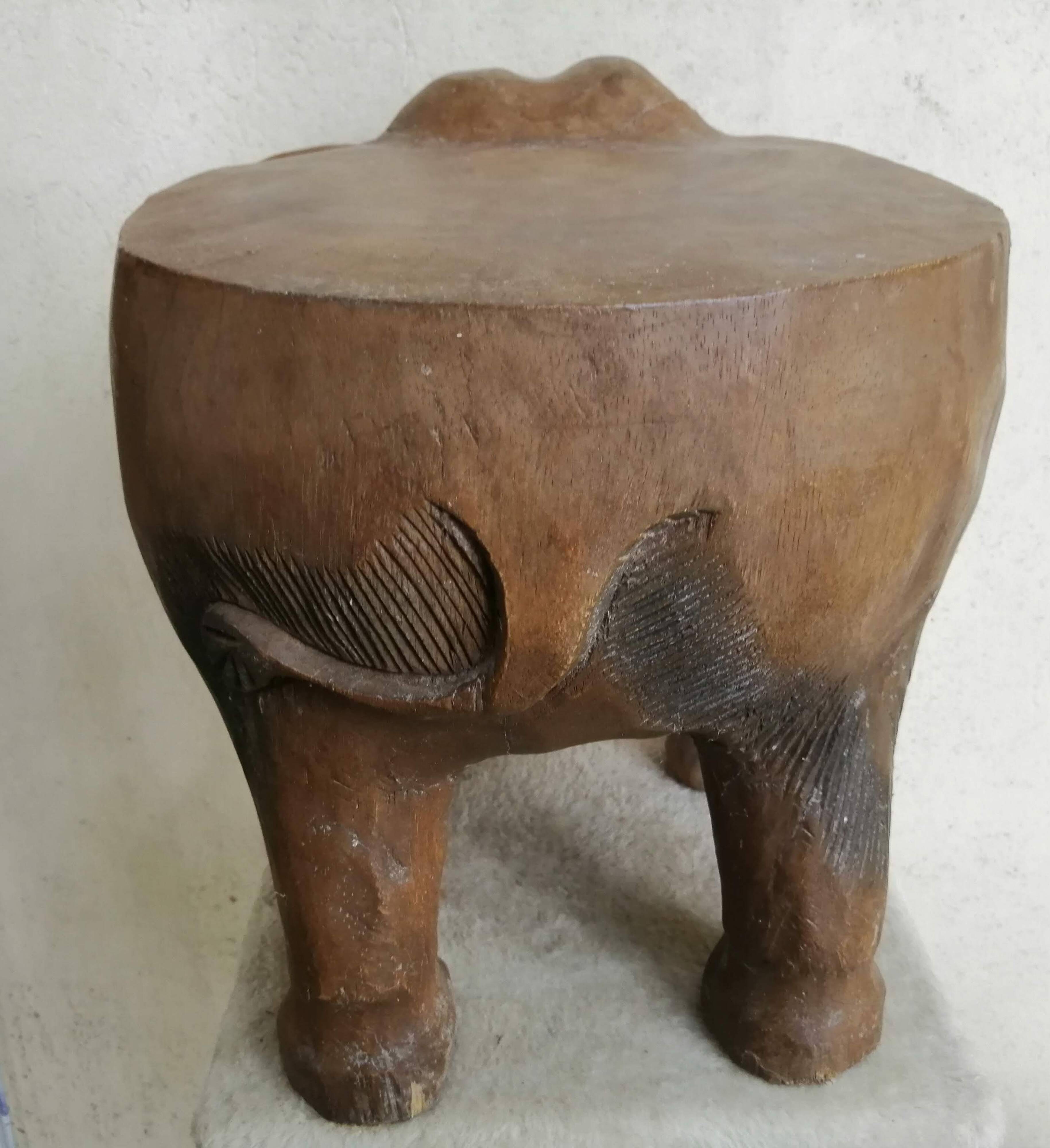 Solid wooden elephant table