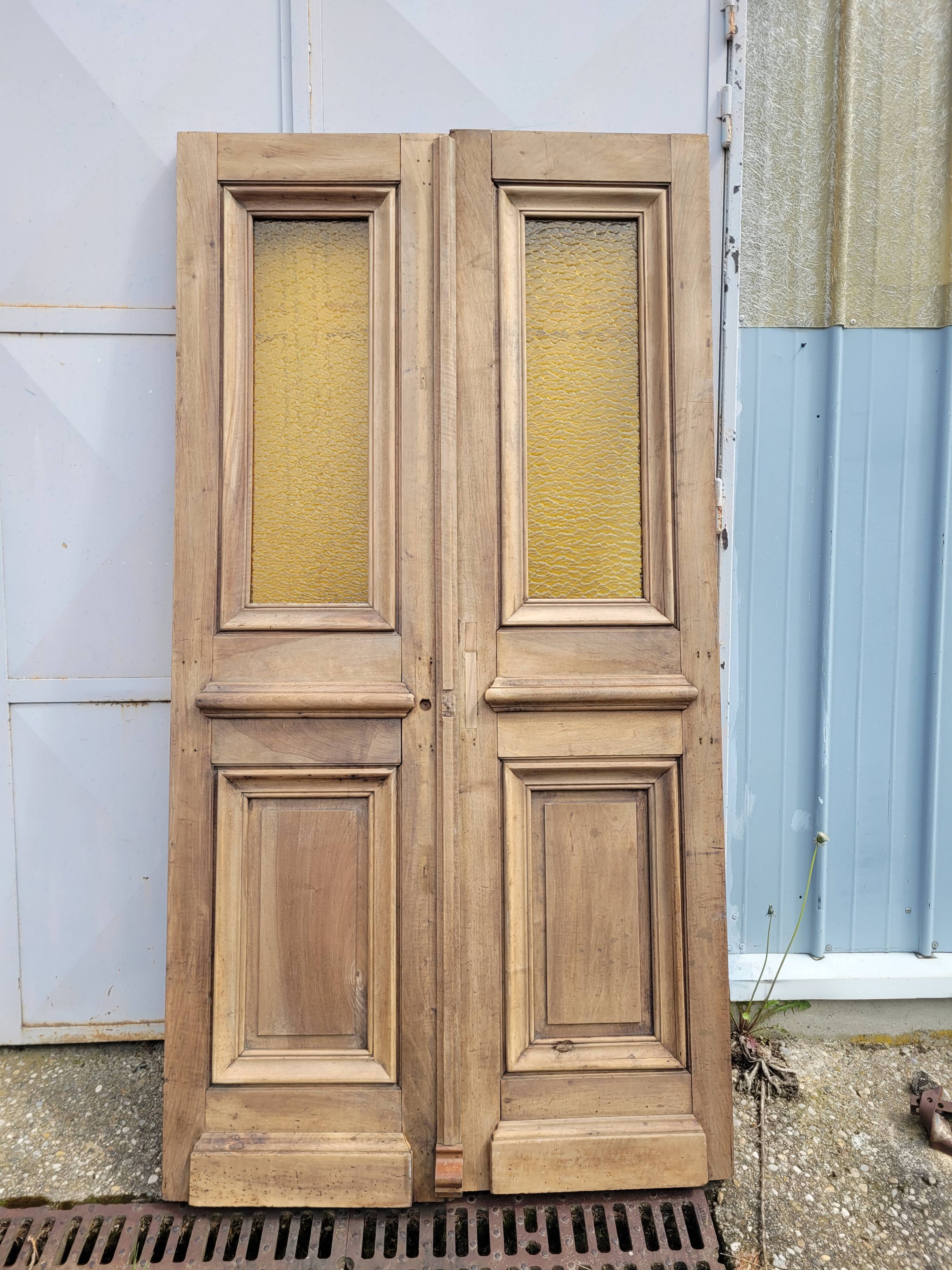 Double porte d'entree haussmannienne du xixéme siecle en noyer massif