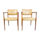 Pair of N.O. Moeller armchairs, model 65, in rosewood and light leather