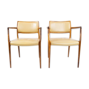 Pair of N.O. Moeller armchairs, model 65, in rosewood and light leather