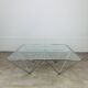 Pyramidal coffee table in chrome-plated steel wire and glass in the style of Piva