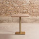 Solid walnut dining table on brass center base