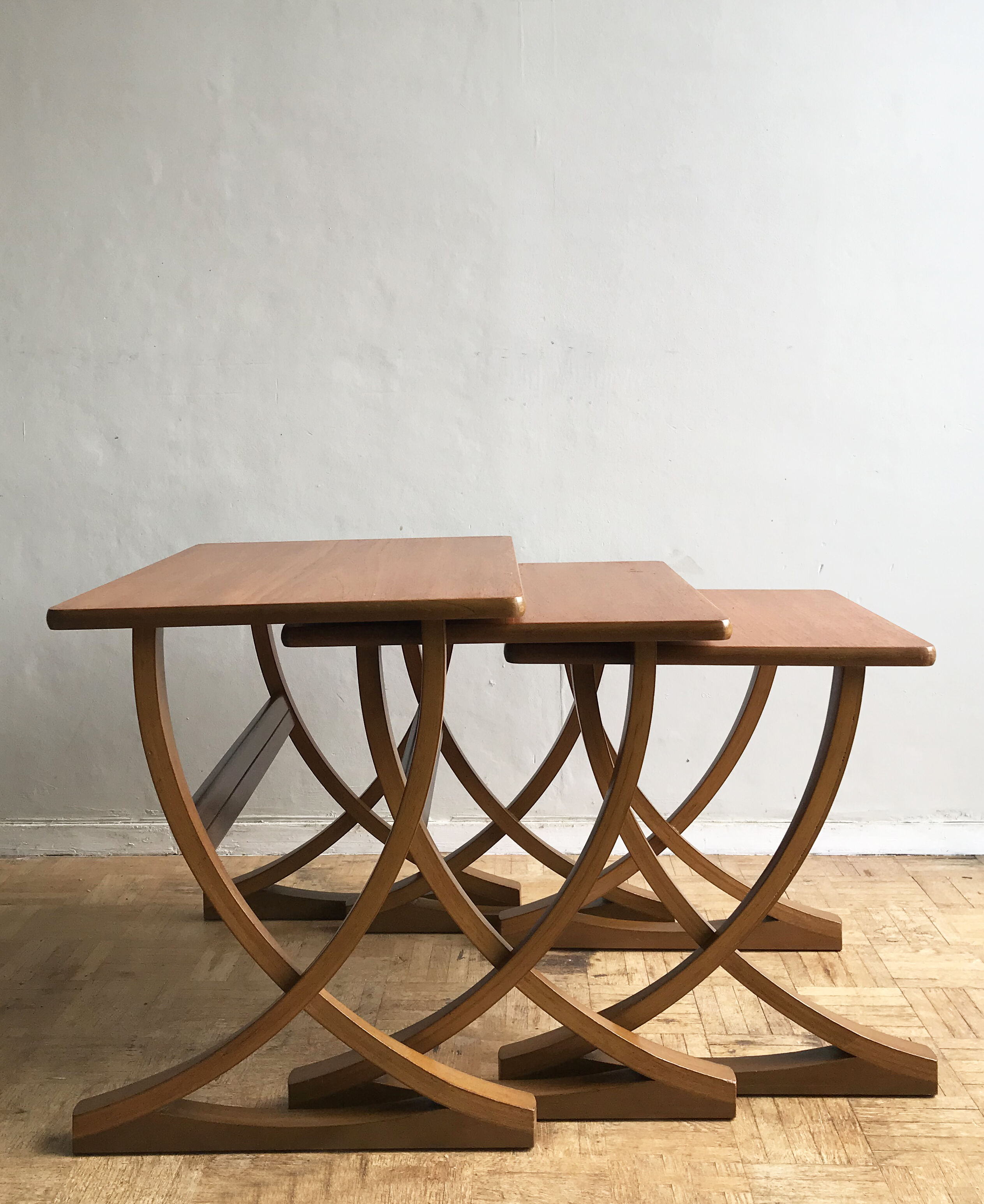 Set of 3 nesting tables from Nathan editions in teak and beech.