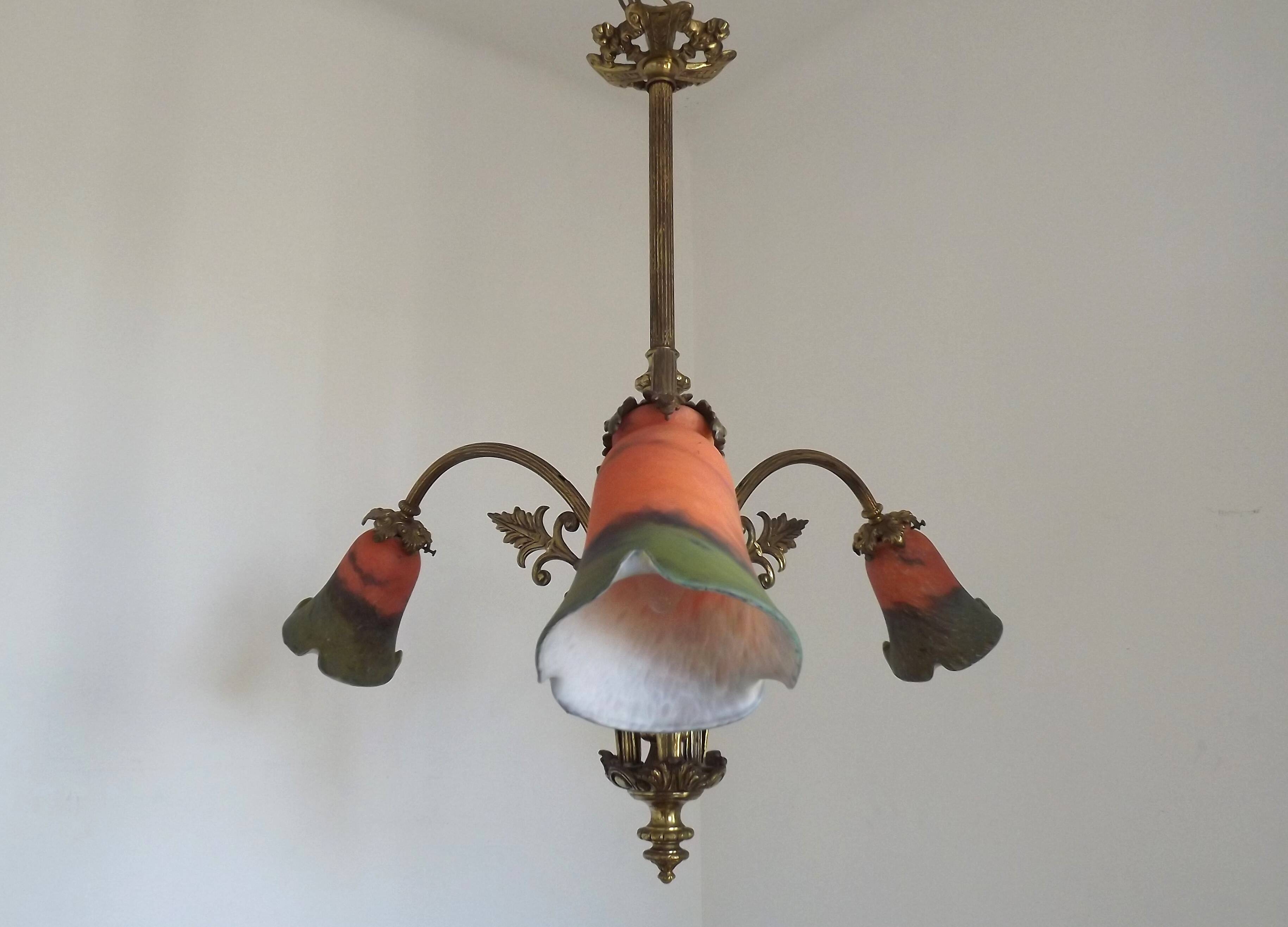 Art Nouveau three-light chandelier in bronze with orange and green glass shade, France.