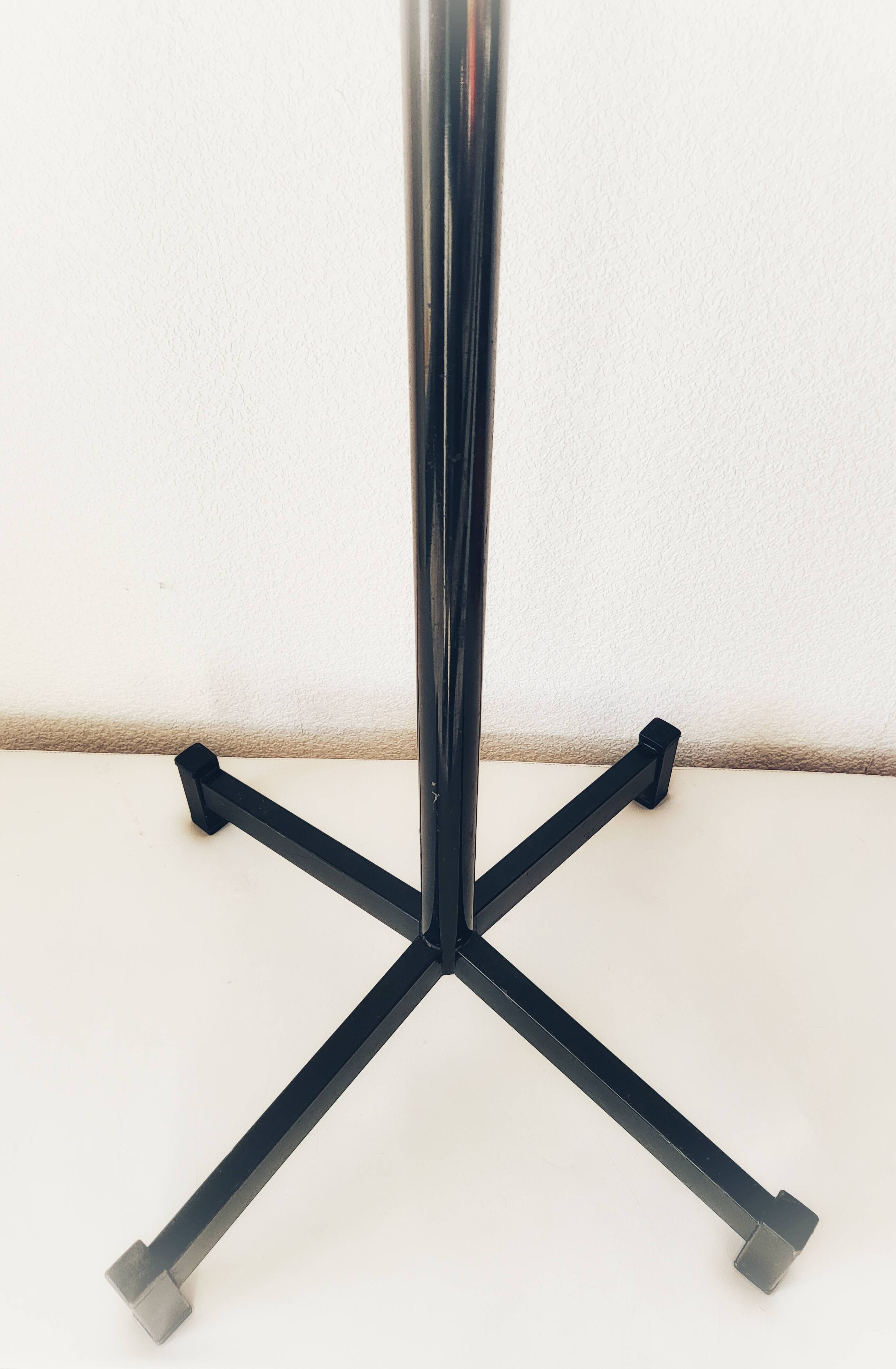 Atomic Coat rack in chrome/black metal and wood.