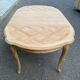 Round extendable dining table Louis XV stripped in solid cherry wood 1960