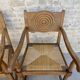 Paire de fauteuils néo-basques, en bois et assise paillée