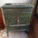 Old green enamelled cast iron pan