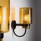 Pair of black metal wall lamps with yellow shades and inner diffuser
