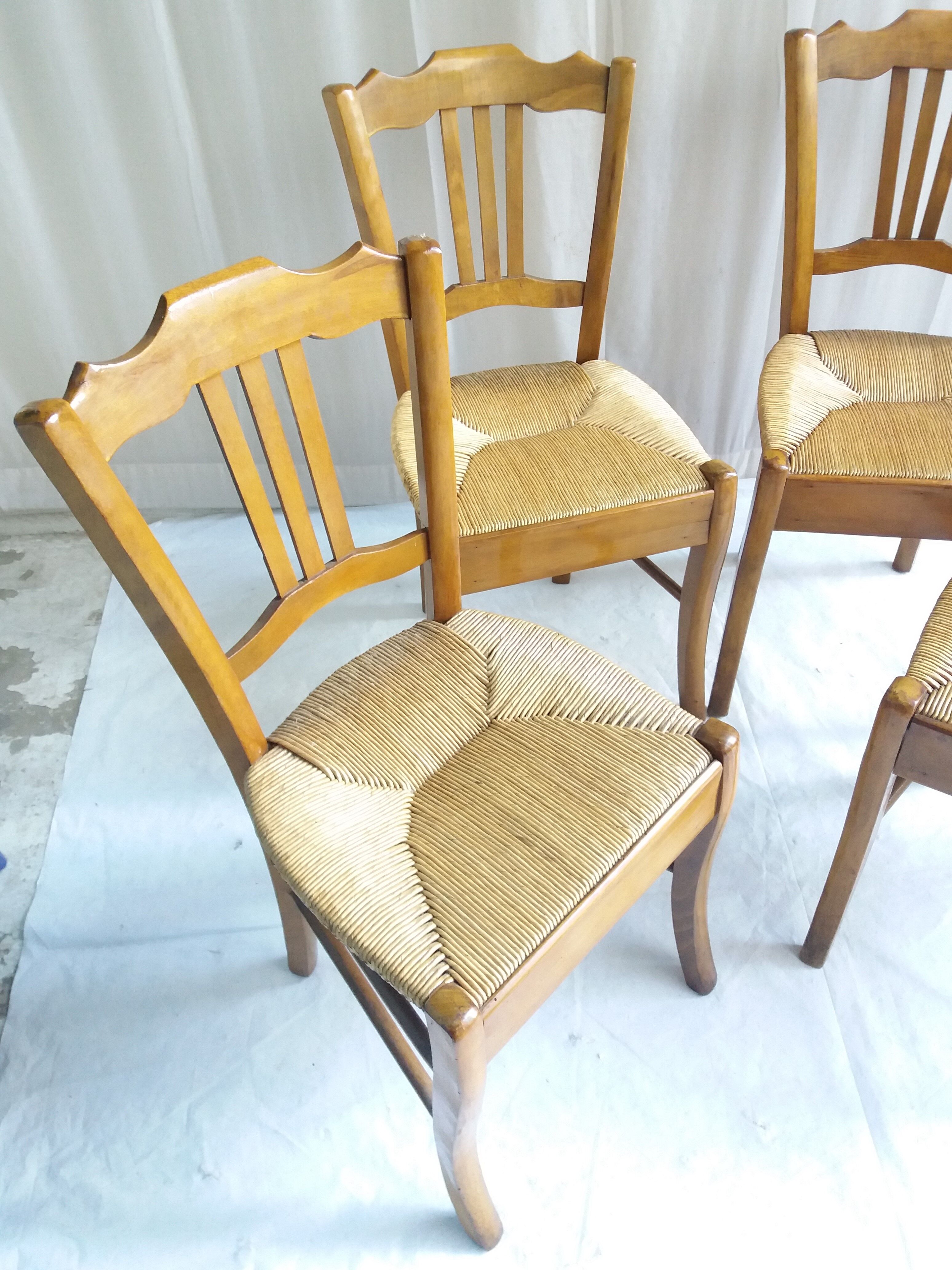 Series of 4 old mulched chairs