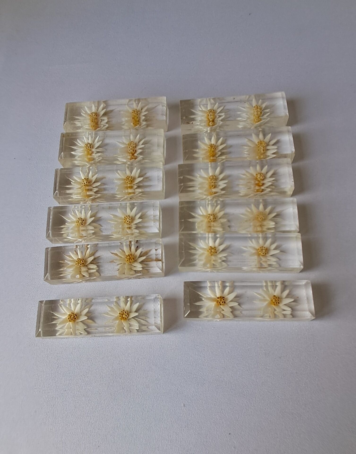 12 knife rests with resin inclusion. 1970s.