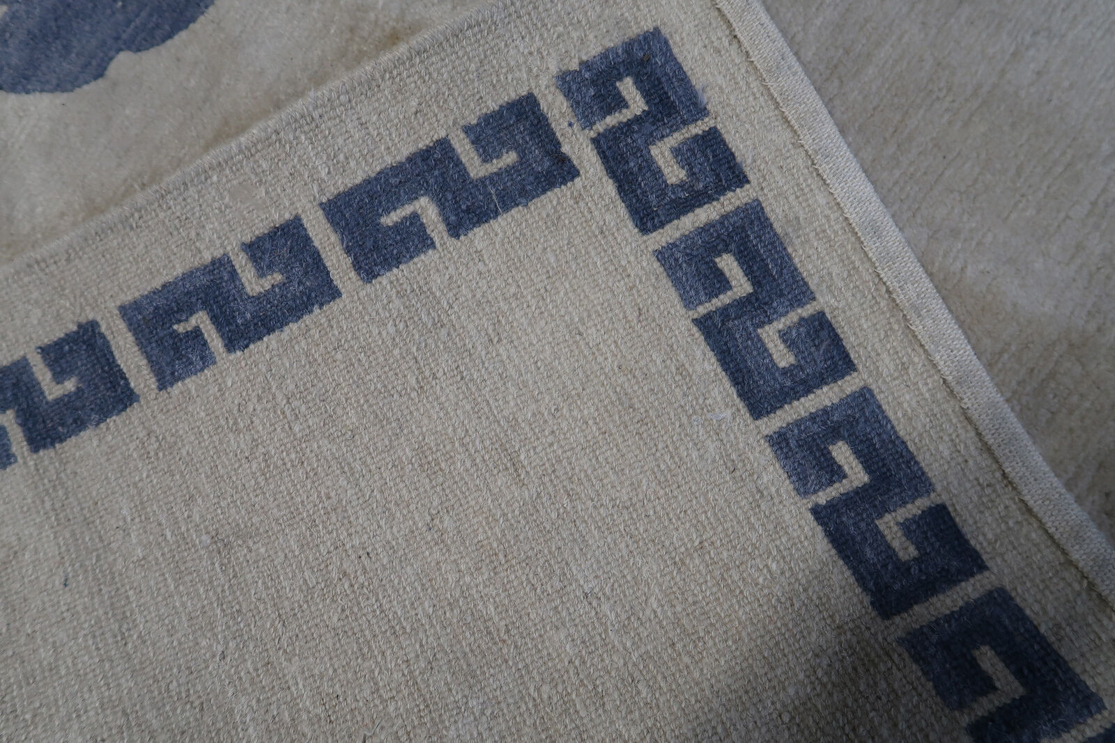 Vintage handmade 4.8' x 6.1' (147 cm x 187 cm) Tibetan Khaden rug from the 1970s