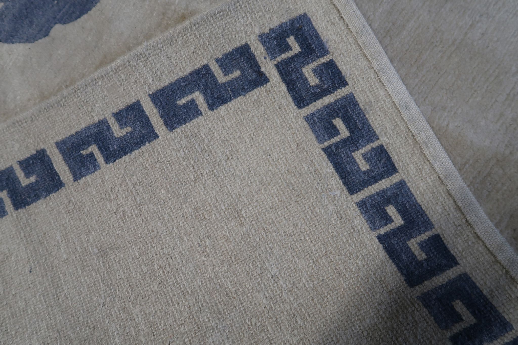 Vintage handmade 4.8' x 6.1' (147 cm x 187 cm) Tibetan Khaden rug from the 1970s