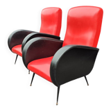 Pair of red and black faux leather armchairs