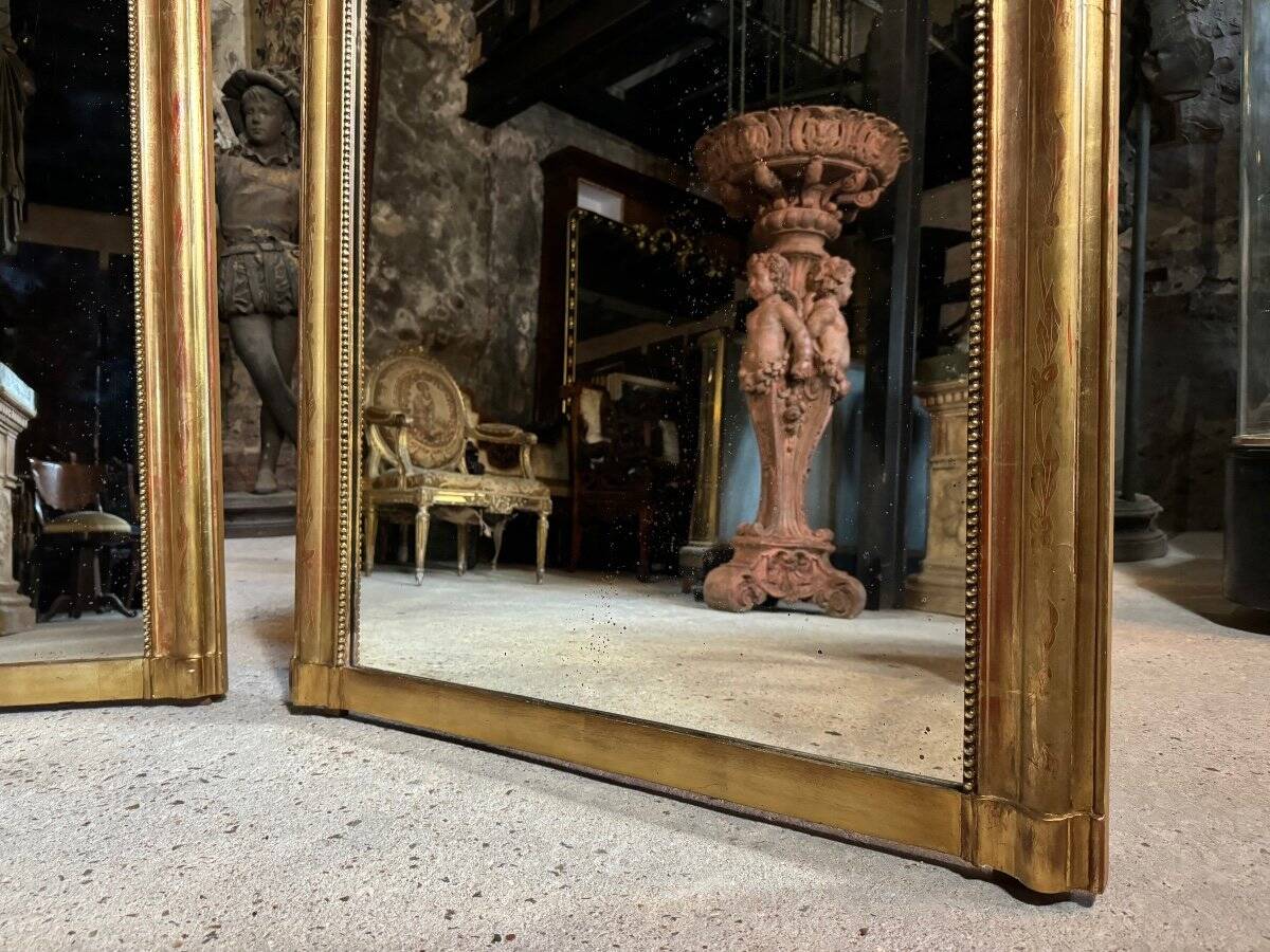 Pair of Louis Philippe period mirrors in gilded wood 1.30m x 89cm