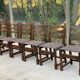 6 solid wood dining chairs with grey woven wool seats.