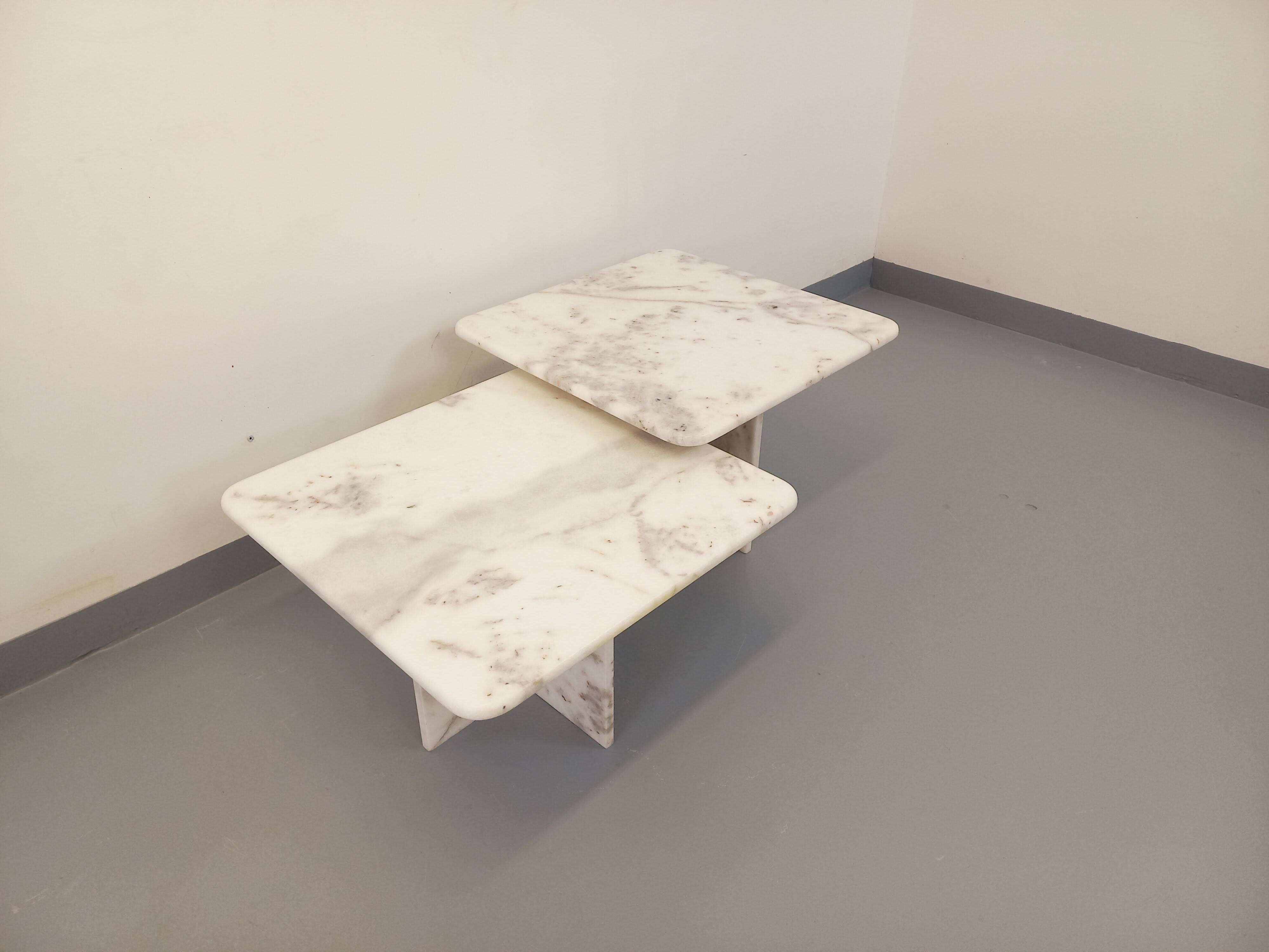 Pair of vintage nesting coffee tables in white marble from the 1970s.