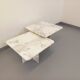 Pair of vintage nesting coffee tables in white marble from the 1970s.
