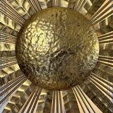 Large golden hammered metal sun wall light with a diameter of 90 cm from the year