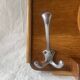 Art Deco wooden wall coat rack with round central mirror