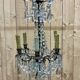 Early 20th century five-light chandelier with bronze and crystal drops