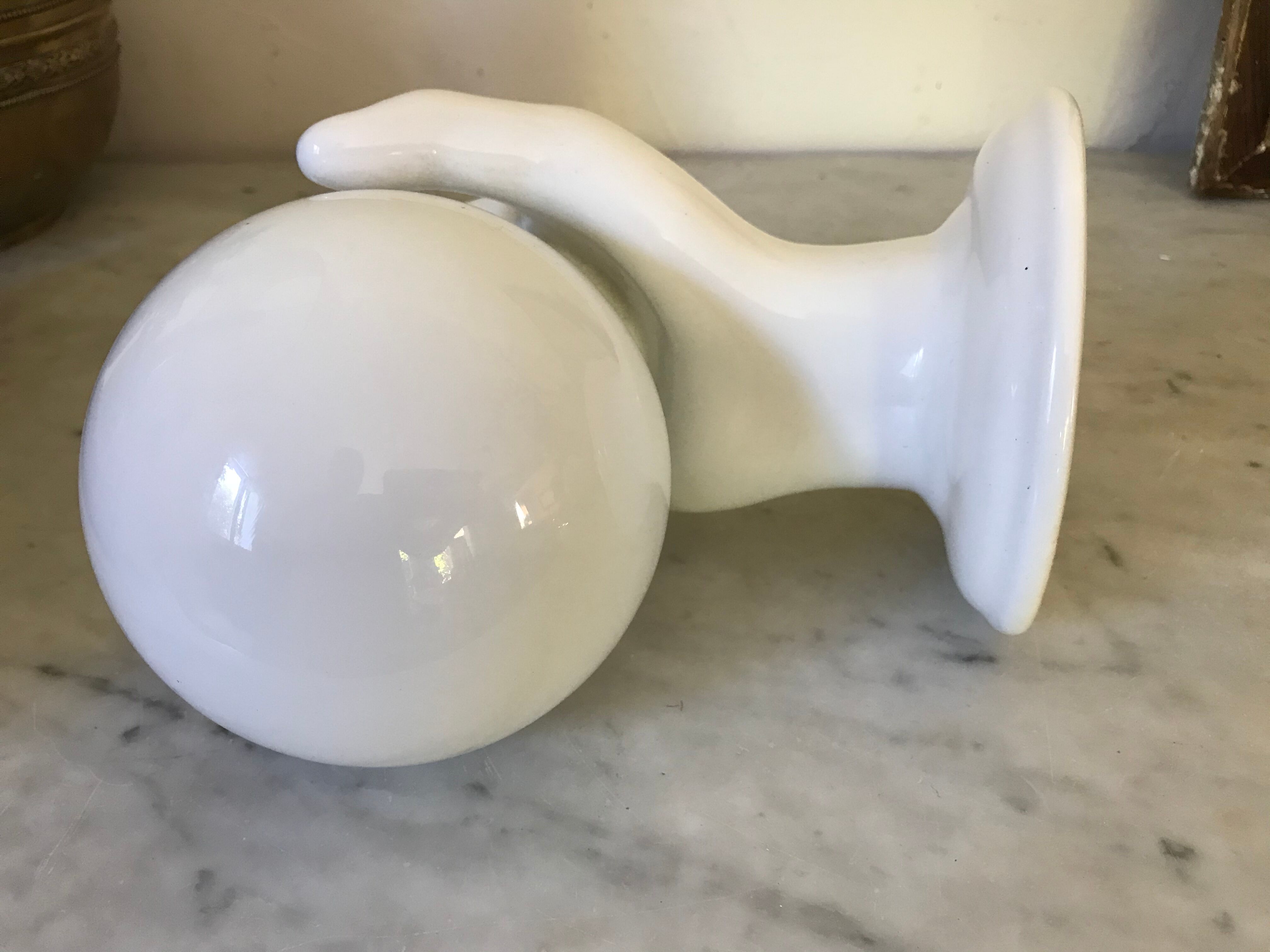 Ceramic hand and opaline sconce