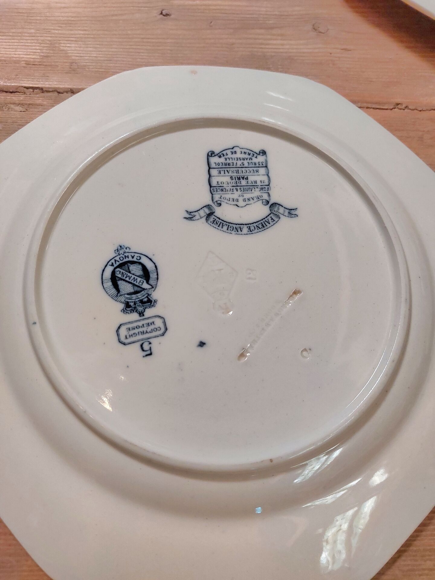 Set of three blue ironstone flat plates.