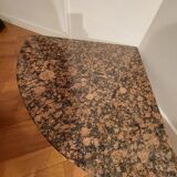 Marbled stone corner table.