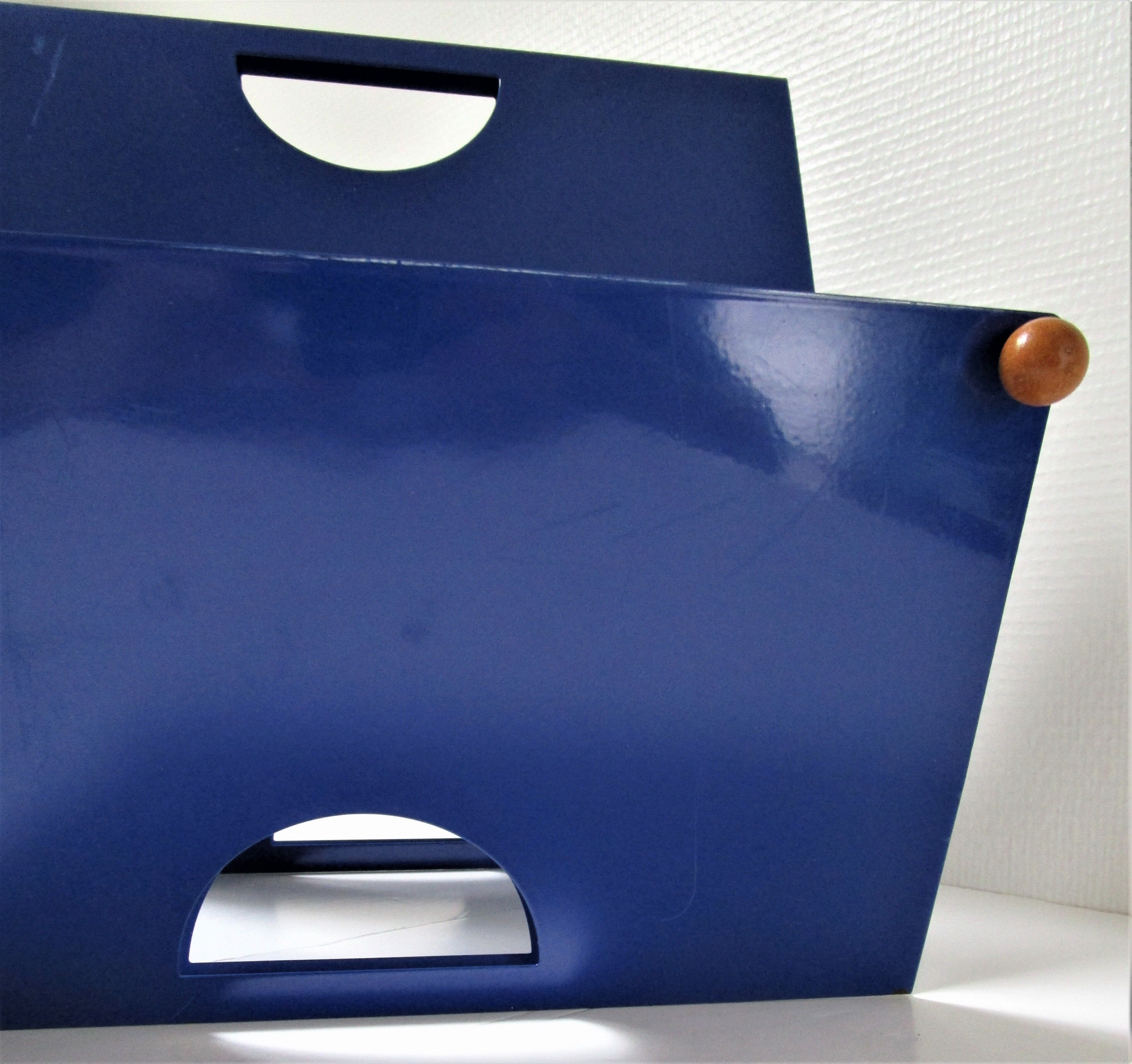 Blue metal magazine holders design 80s