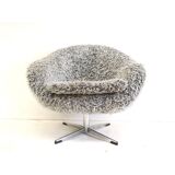 Grey swivel armchair with metal star base made in the 70s