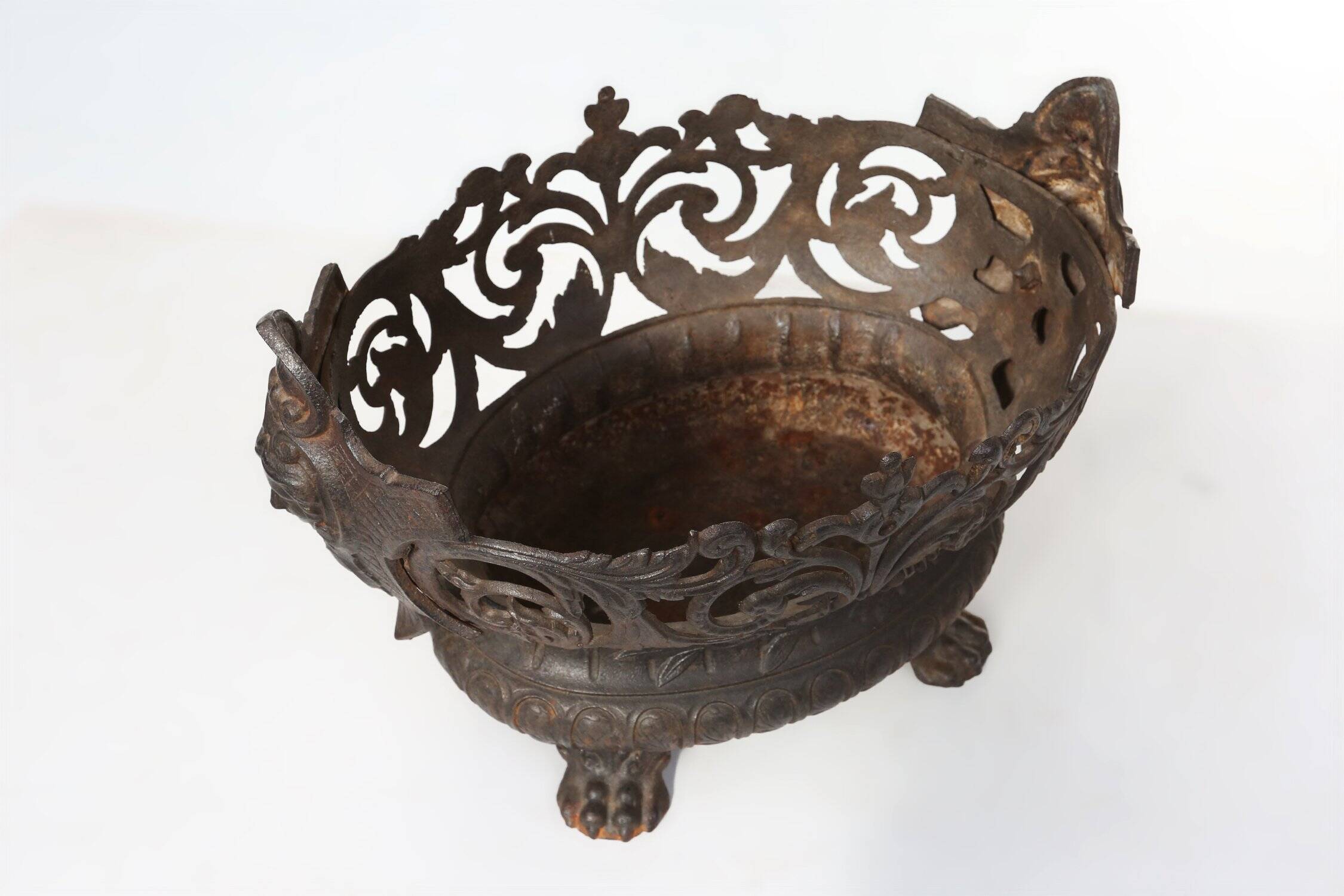 Cast Iron planter decorated with masks and lion paws, France 1850s