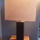 Tall cubic brown leather lamp, light gray fabric lampshade