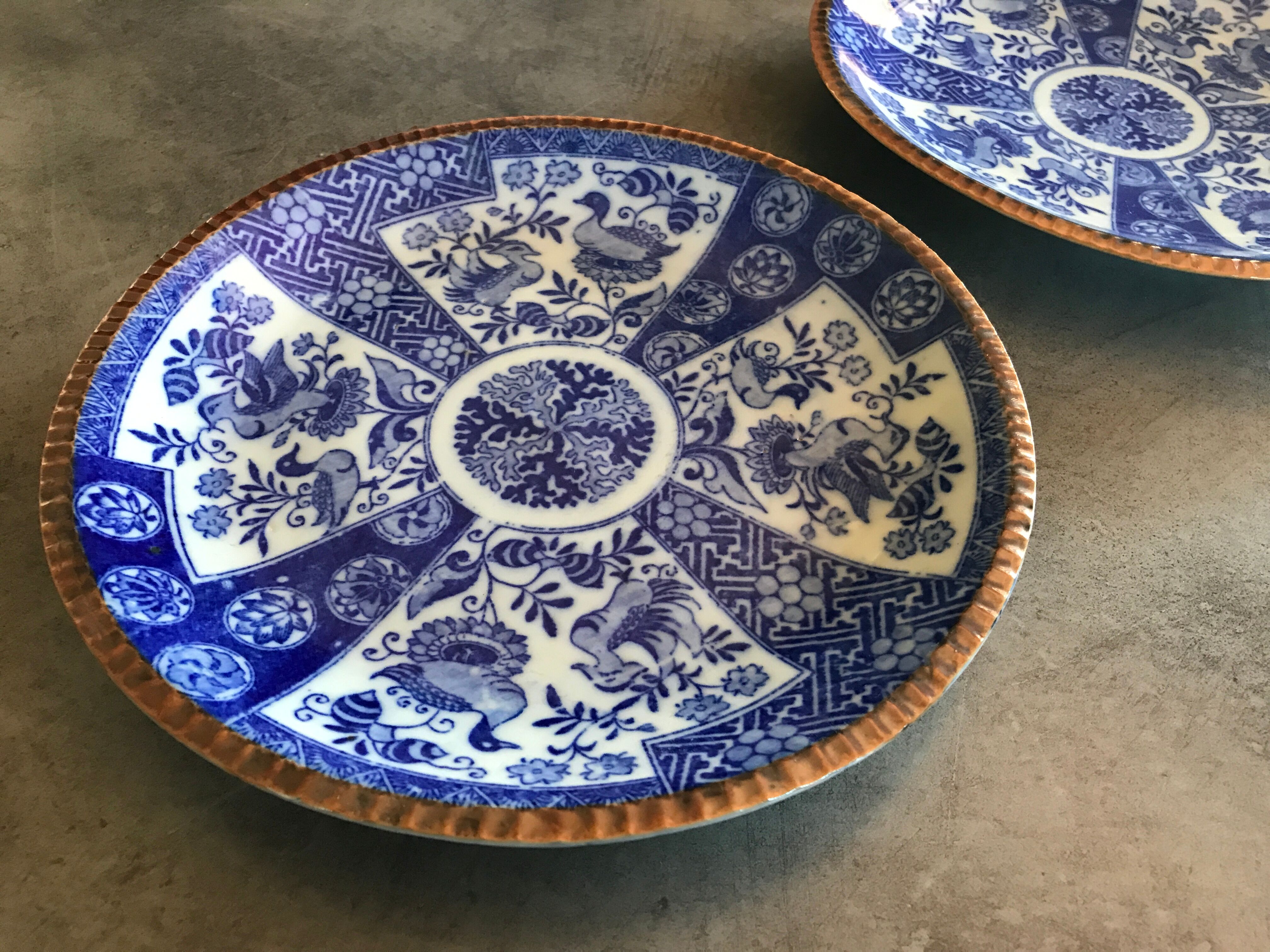 Pair of vintage japanese igezara plates decorated with floral and bird motifs