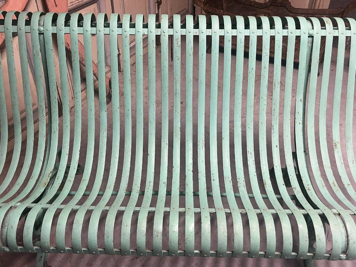 Garden bench in wrought iron and cast iron, late 19th century.