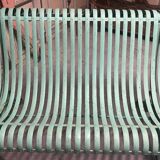 Garden bench in wrought iron and cast iron, late 19th century.