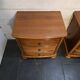 Pair of Louis Philippe style bedside tables in cherry wood.