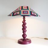 Table lamp in turned wood and printed conical shade