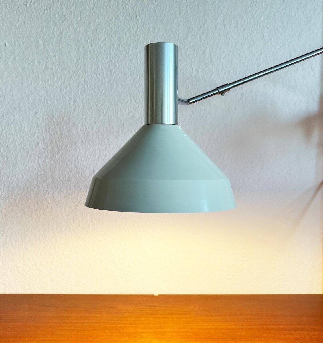 Mid-century minimalist Swiss table lamp with a clamp by Rosemarie and Rico Baltensweiler for Baltensweiler, 1950s.
