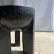Black mango wood tripod side table with a semi-spherical top, height: 45 cm, diameter: 44 cm.