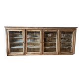 Old wooden shop display case to hang from the early 20th century.