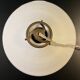 Suspension rises and falls with counterweight in porcelain and opaline