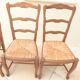 8 Straw chairs with high backs in solid wood