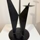 Vintage black metal brutalist tripod candlestick