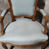 Reupholstered Louis XV convertible armchairs