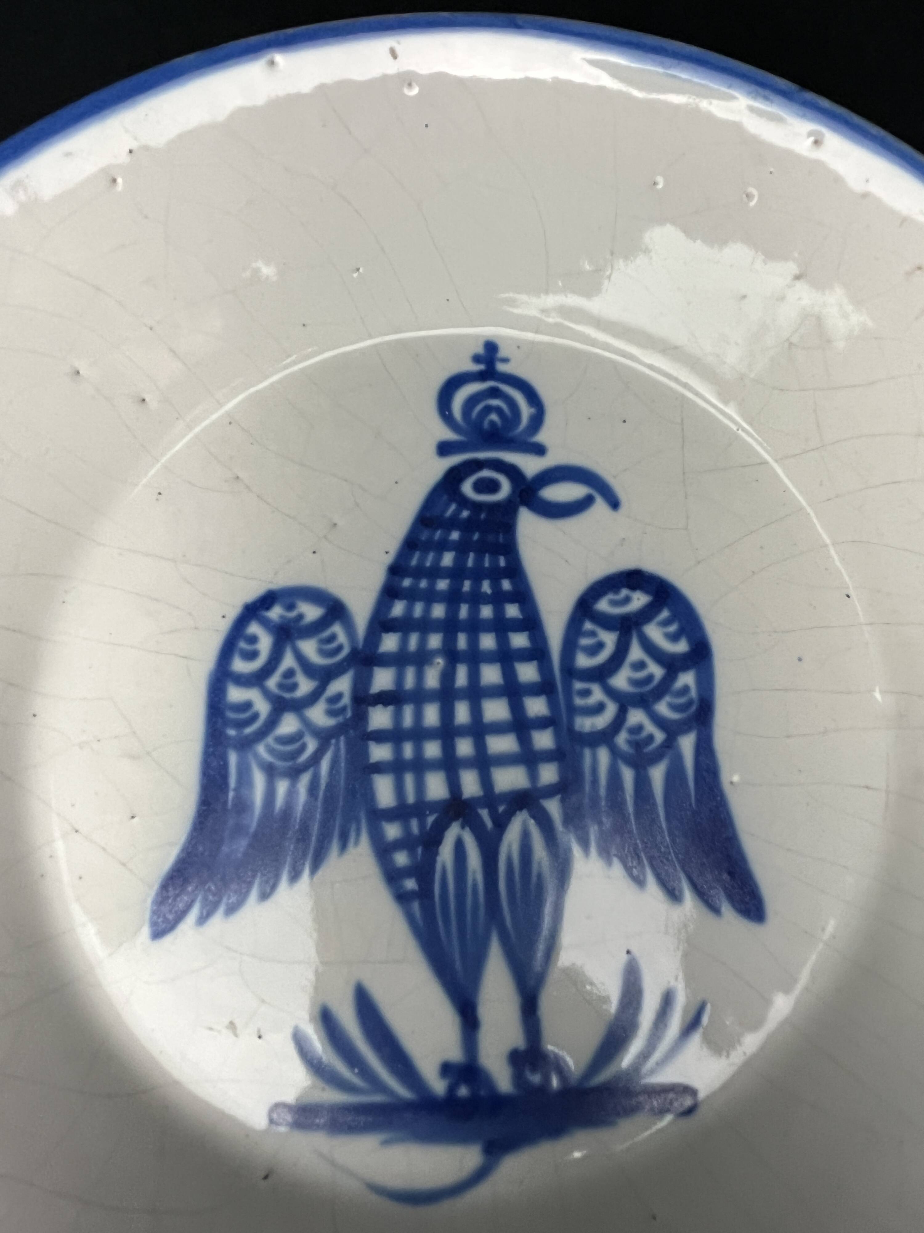 Besançon, dish decorated with a blue eagle, early 19th century
