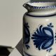 Artisan blue floral decorative carafe, height 17 cm, diameter 24.5 cm.